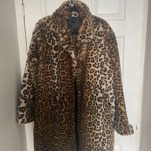 Luxurious leopard fur coat vintage style